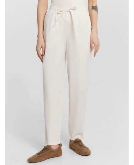 Брюки молочный