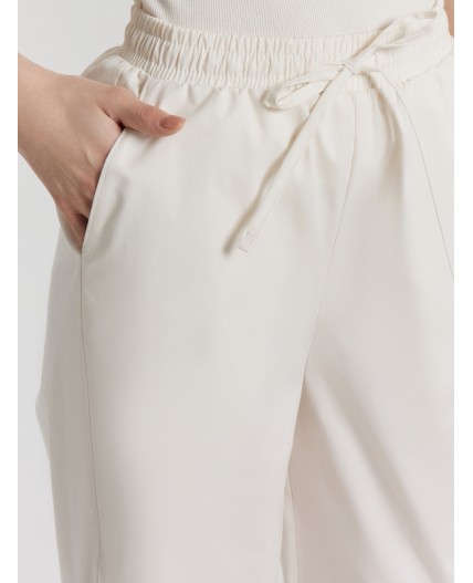 Брюки молочный