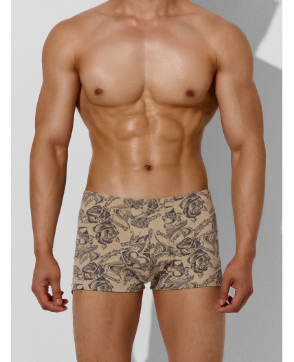 Трусы тату на бежевом