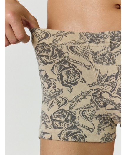 Трусы тату на бежевом