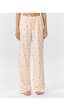 Брюки цветочки на персиковом креме
