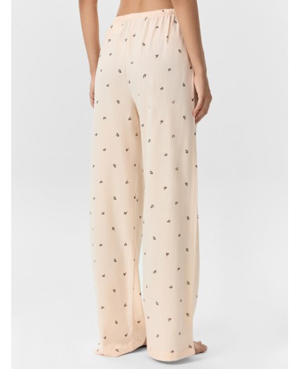 Брюки цветочки на персиковом креме