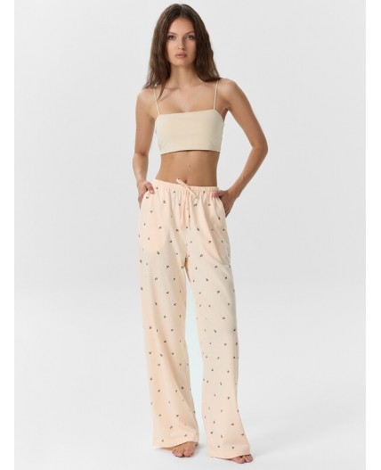 Брюки цветочки на персиковом креме