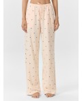 Брюки цветочки на персиковом креме