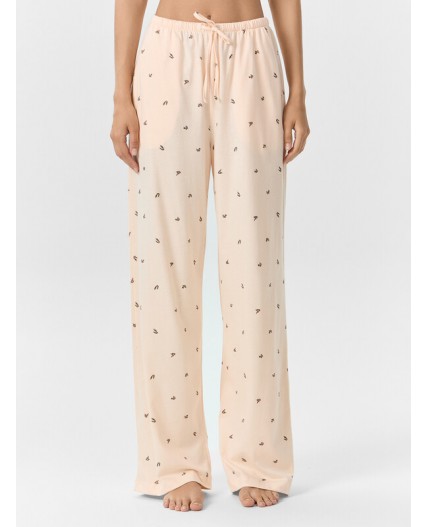 Брюки цветочки на персиковом креме