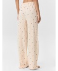 Брюки цветочки на персиковом креме