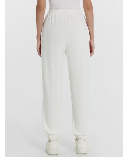 Брюки молочный