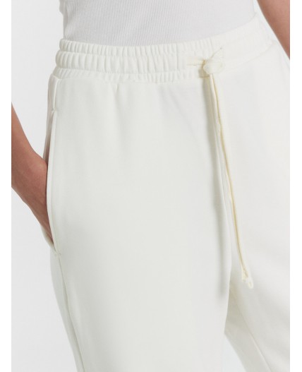 Брюки молочный