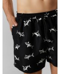 Трусы купальные акулы на черном