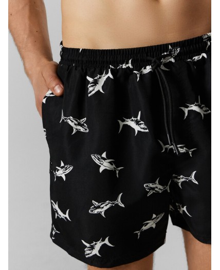 Трусы купальные акулы на черном