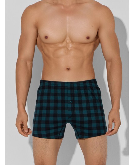 Трусы черная клетка на зеленом