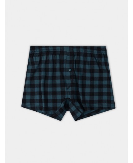 Трусы черная клетка на зеленом