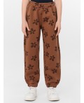 Брюки цветочки на коричневом