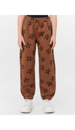 Брюки цветочки на коричневом