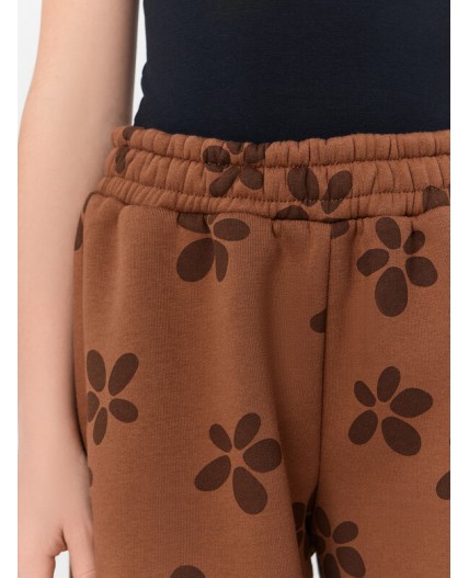 Брюки цветочки на коричневом