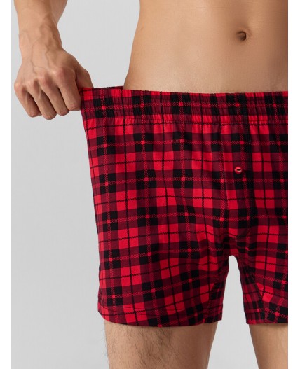 Трусы черная клетка на красном