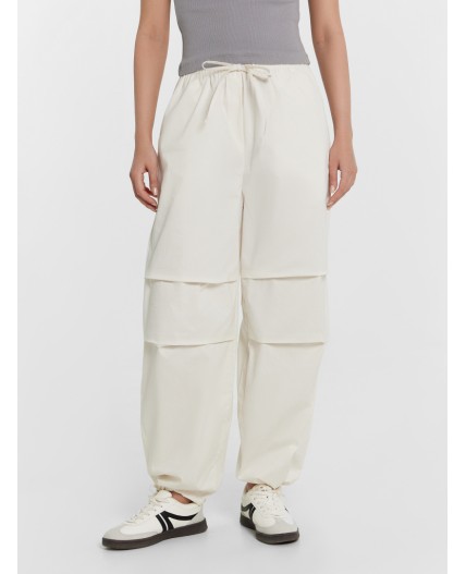 Брюки молочный