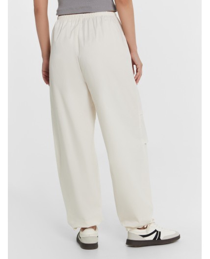Брюки молочный